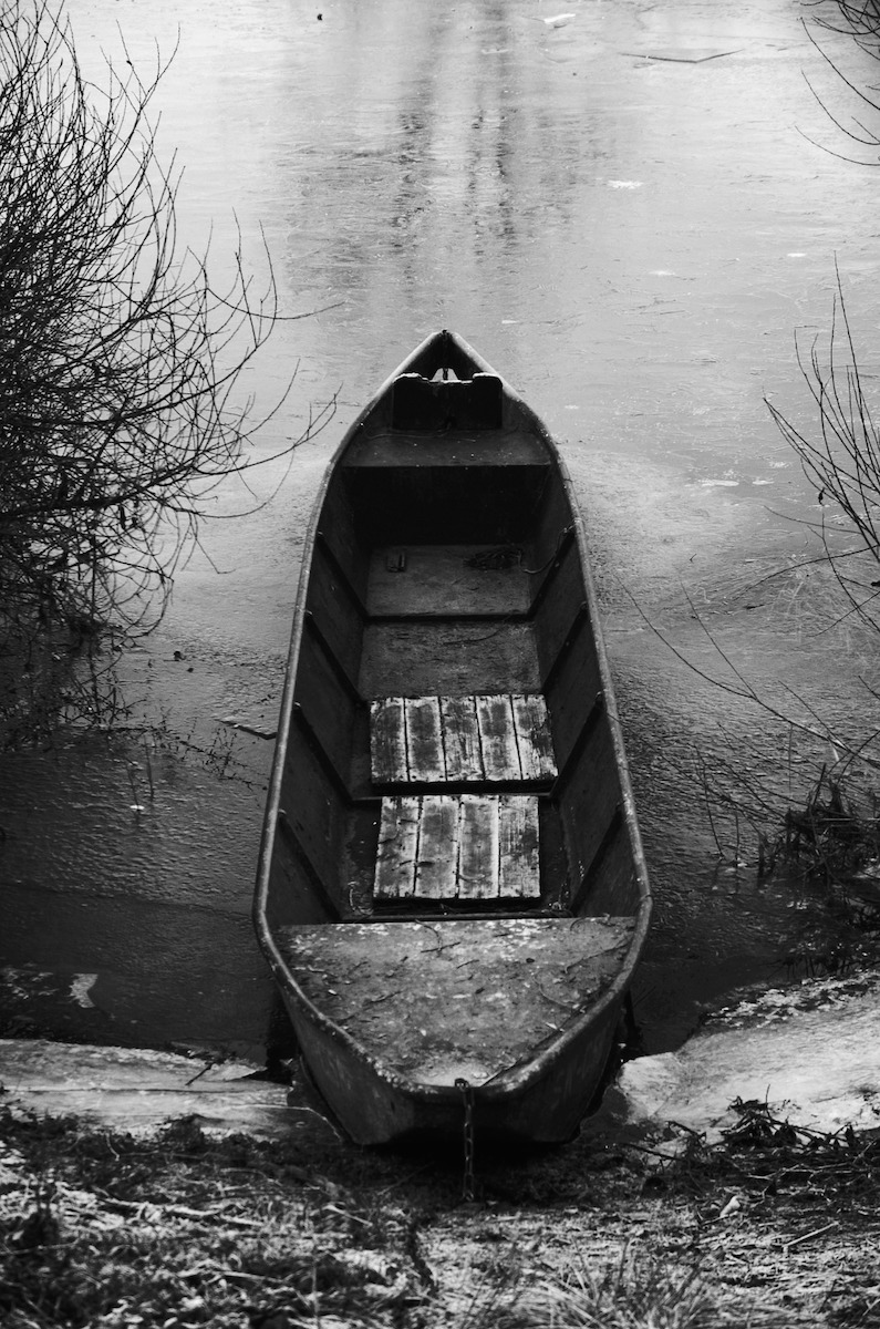 old boat in water