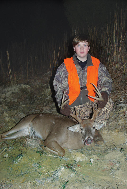 Young John Jacob Utsey killed this ten-point buck as it headed to a food plot.