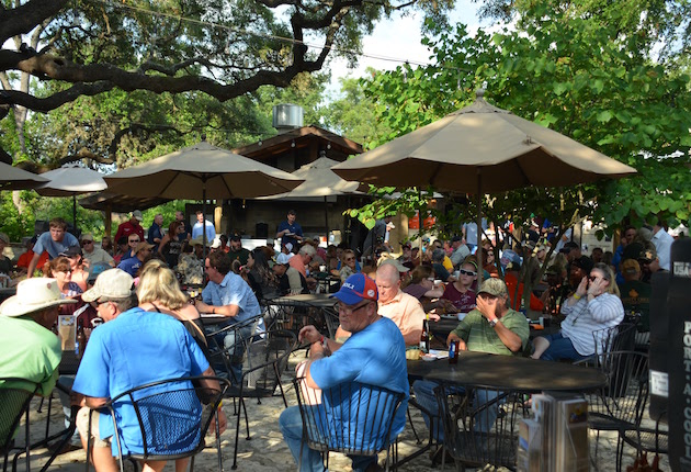 Competitors ended the day's shooting events with a charity auction to benefit Trinity Oaks.