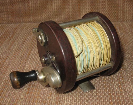 An A.H. Fox level-wind fishing reel.