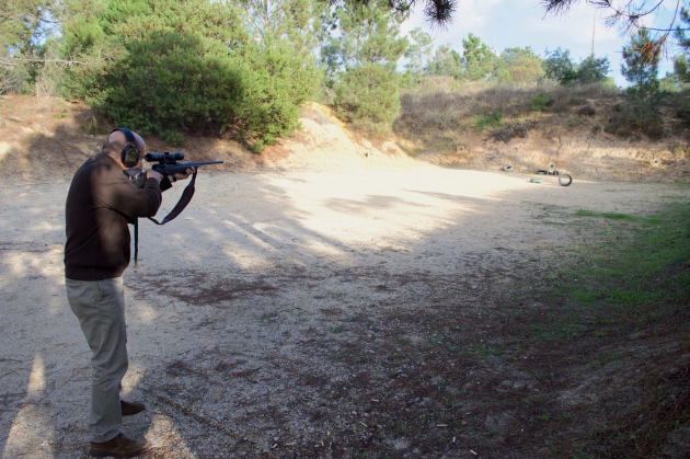 Shooting as quickly and accurately as possible at four targets.