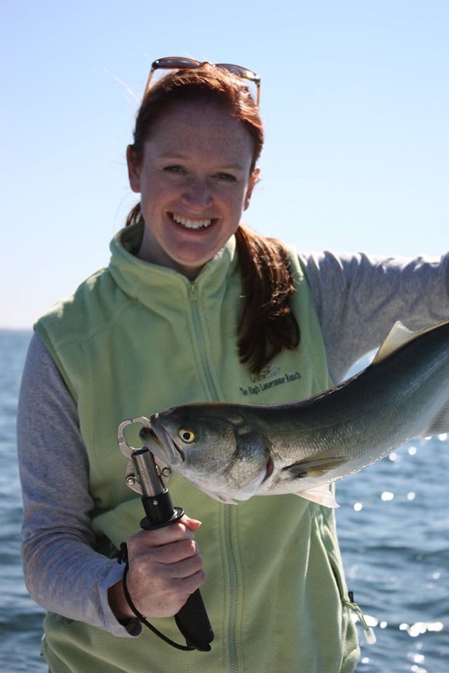 The author's wife, Angela, and her catch of the day. Social media has its downsides, but sharing this catch with far-away friends isn't one of them.