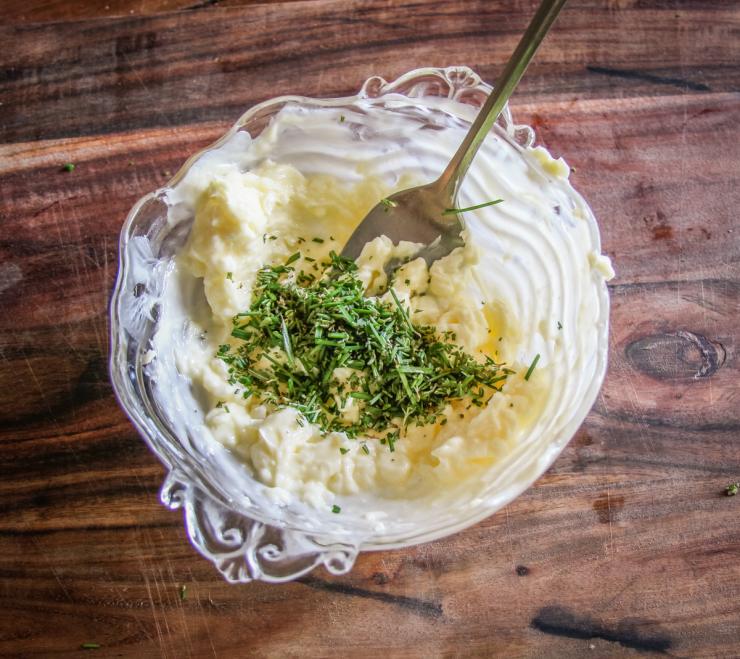 mixing herbs with butter