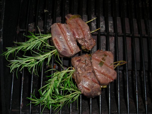 Venison steaks on rosemary skewers