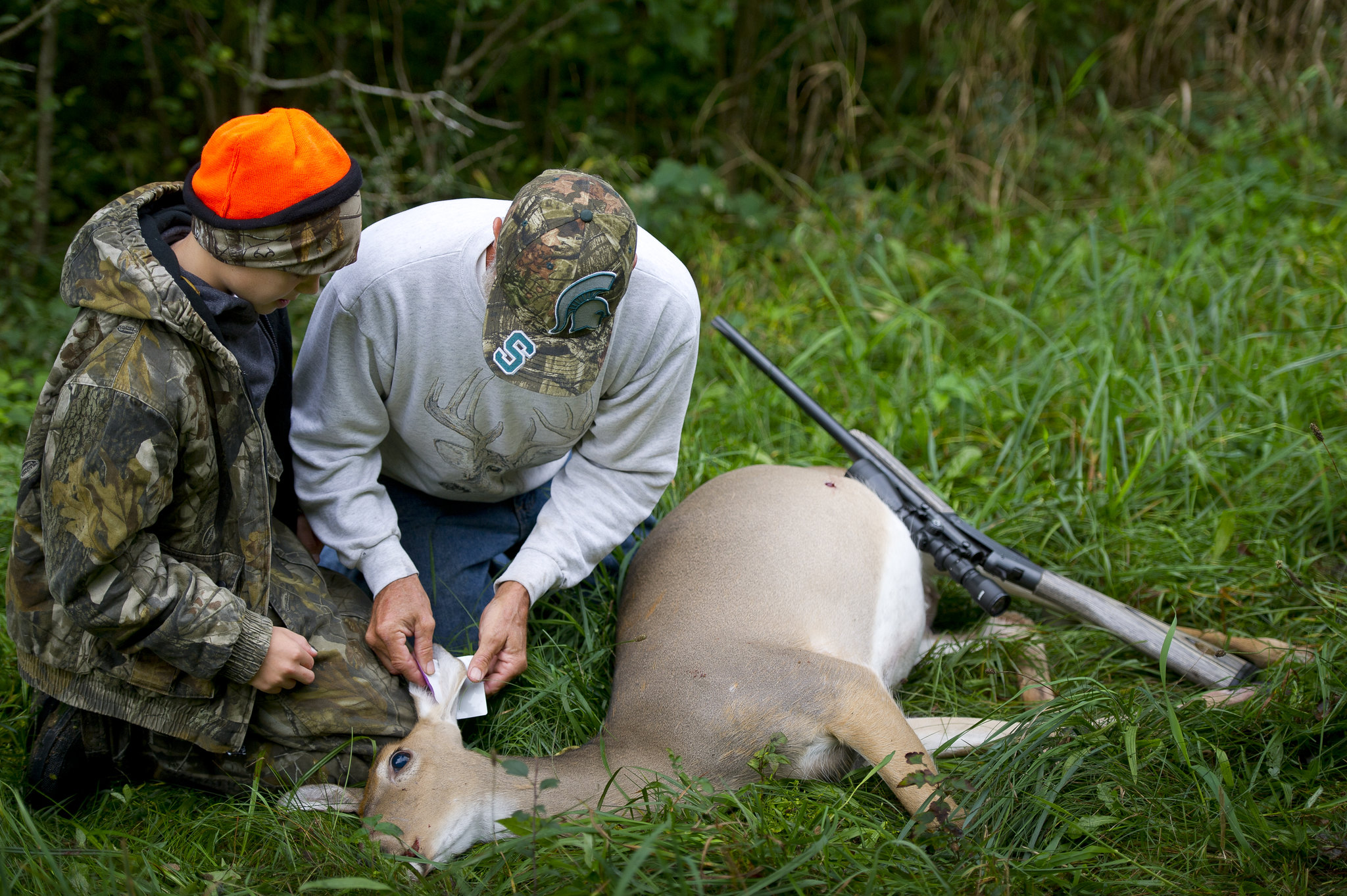 youth hunter whitetail deer