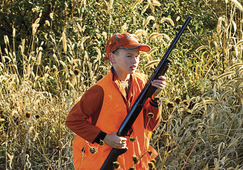 boy pheasant hunting
