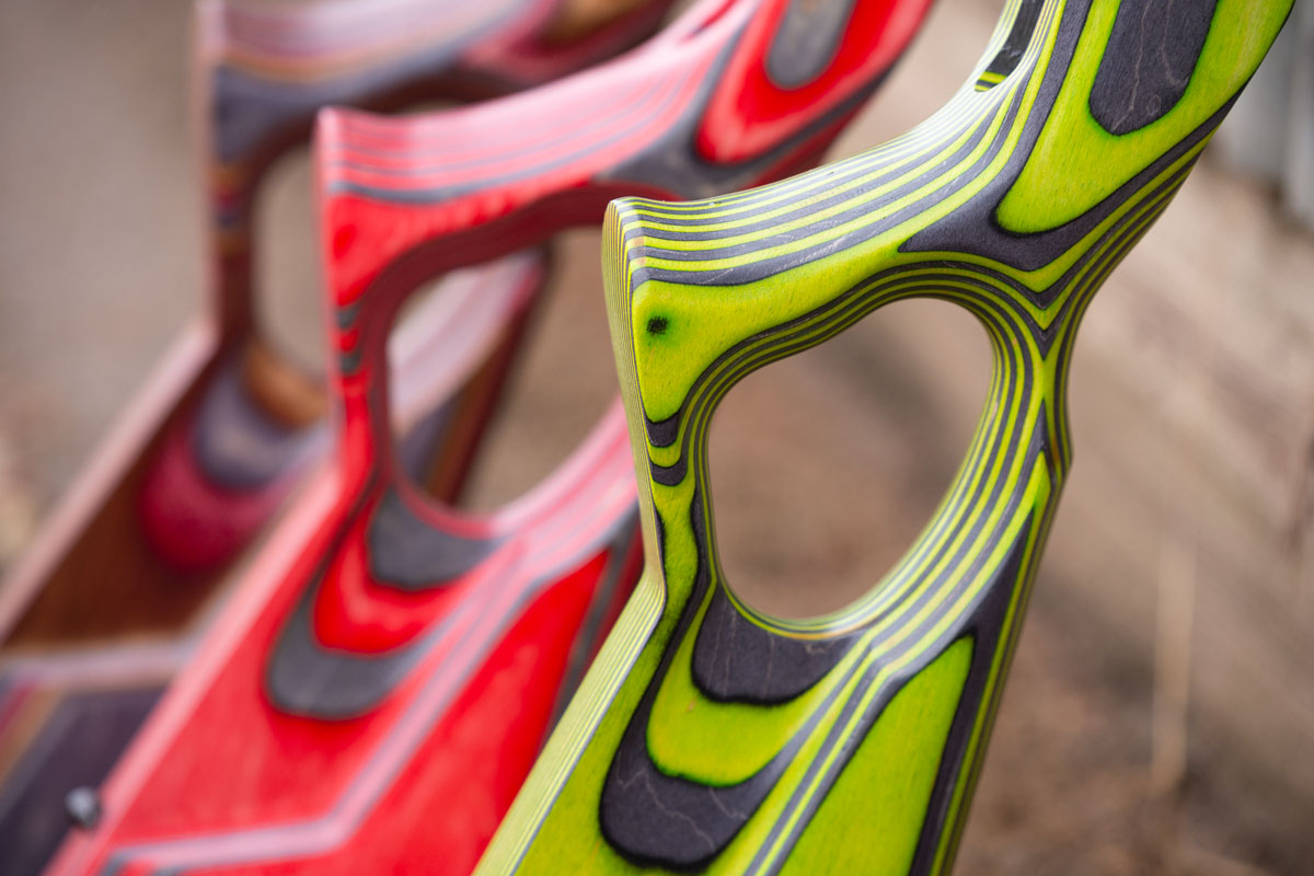 close up of colored laminated replacement rifle stocks