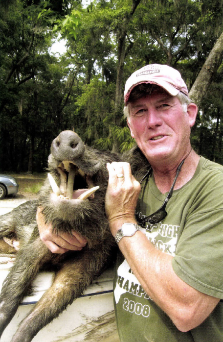 hunter with hog