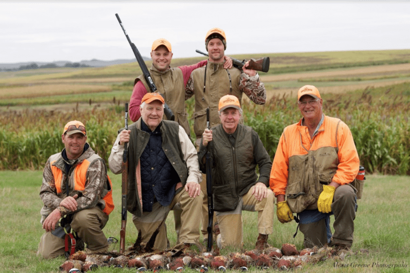 hunters with pheasants