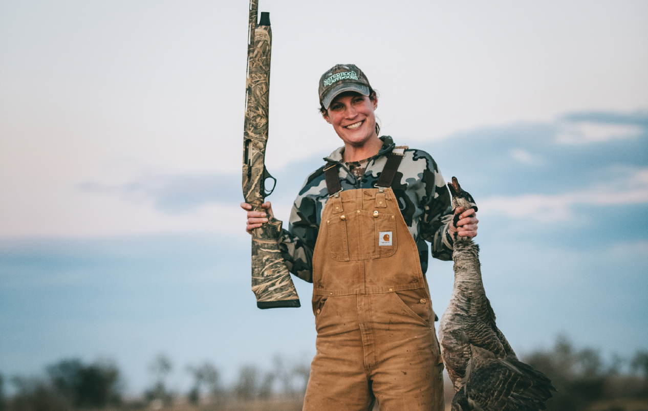 woman hunter with goose