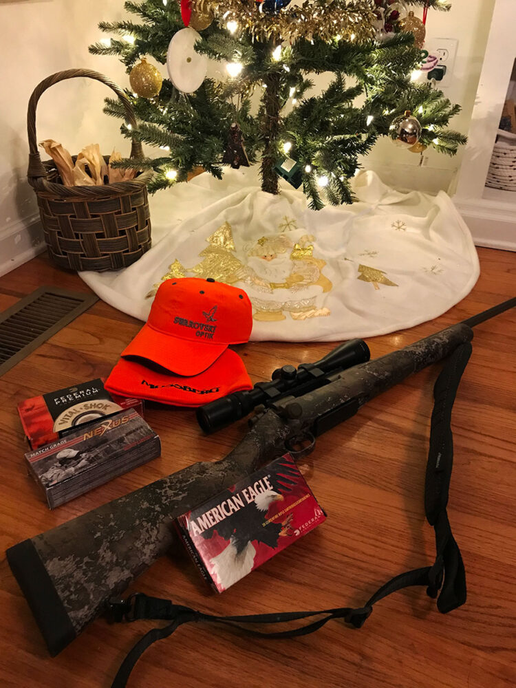 rifle under tree