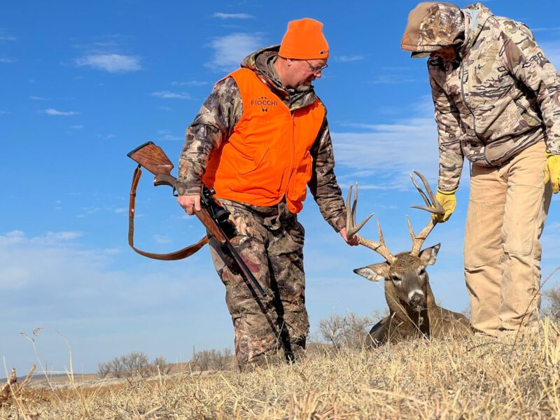 Hunters dragging deer